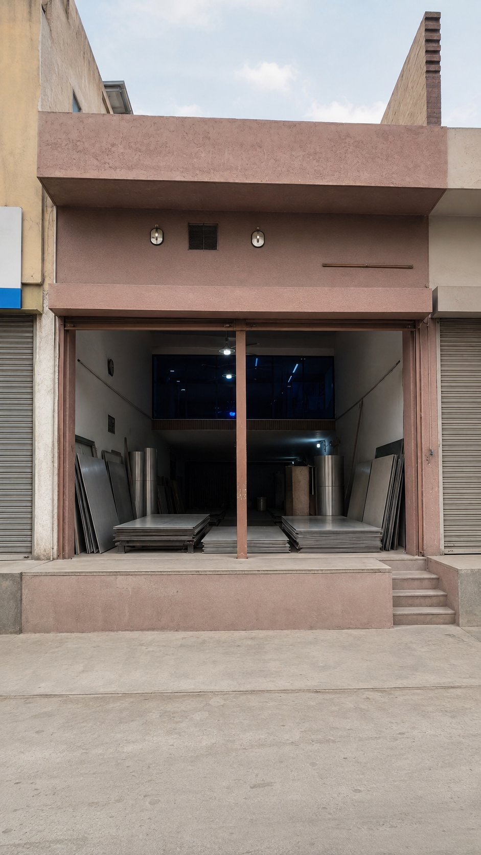 Choudhary Steel House shop with stainless steel sheets displayed inside